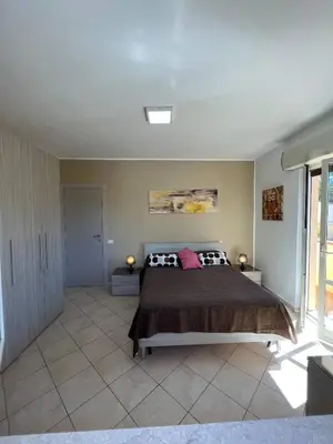 Letto o letti in una camera di first floor lido house with terrace for exclusive use