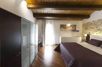 Letto o letti in una camera di Casa Hybla