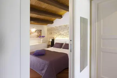 Letto o letti in una camera di Casa Hybla