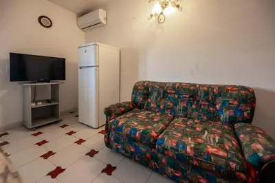 TV o dispositivi per l'intrattenimento presso Mare Blu Apartment - Sicilia Vacanza