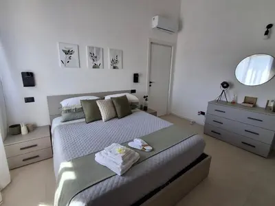 Letto o letti in una camera di Ti porto al mare - Luxury & Relax