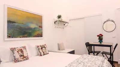 Letto o letti in una camera di Palace Apartments Central Catania