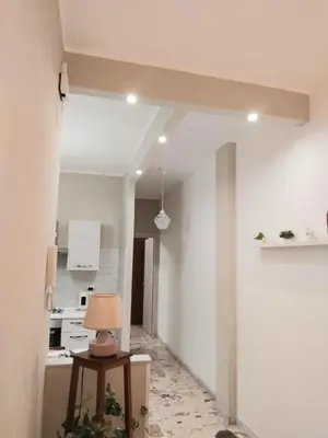 Cucina o angolo cottura di VITTORIA APARTMENT 4 posti letto parcheggio libero