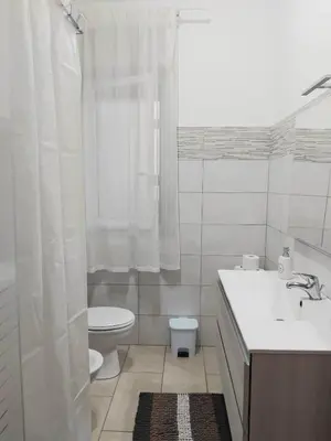 Bagno di VITTORIA APARTMENT 4 posti letto parcheggio libero