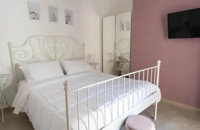 Letto o letti in una camera di Relax Casa Bacchilide
