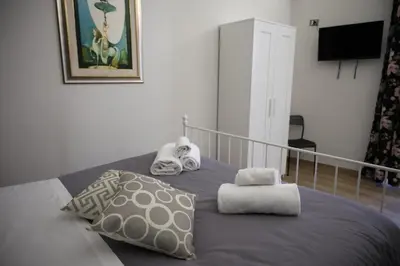 Letto o letti in una camera di Casa Vittorio