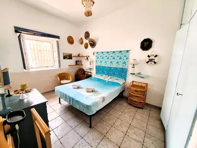 Letto o letti in una camera di Villa il Timone
