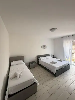 Letto o letti in una camera di Peppino's Home, Catania Centro