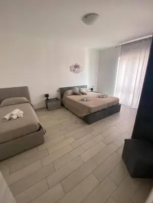 Letto o letti in una camera di Peppino's Home, Catania Centro