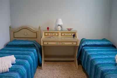 Letto o letti in una camera di La Dimora del Cuore