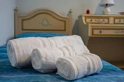 Letto o letti in una camera di La Dimora del Cuore