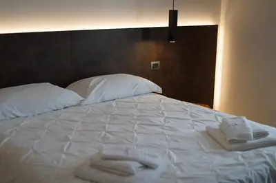 Letto o letti in una camera di Tenuta San Marco