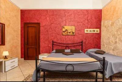 Letto o letti in una camera di Evy house