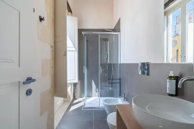 Bagno di La Dimora di San Nicola Ortigia Boutique Apartments - Terrace & Jacuzzi Access