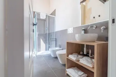 Bagno di La Dimora di San Nicola Ortigia Boutique Apartments - Terrace & Jacuzzi Access
