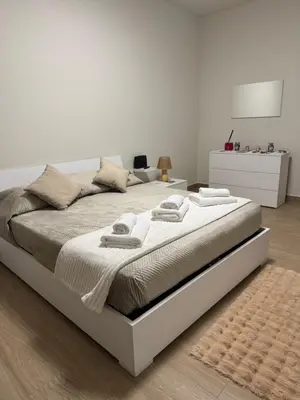Letto o letti in una camera di Sofia Home