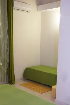 Letto o letti in una camera di Casa Vacanze Calafarina