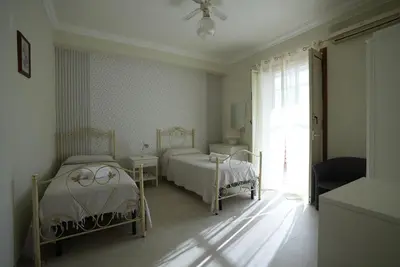 Letto o letti in una camera di Villamodica a family villa 20 min from the beach