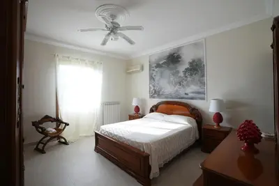 Letto o letti in una camera di Villamodica a family villa 20 min from the beach