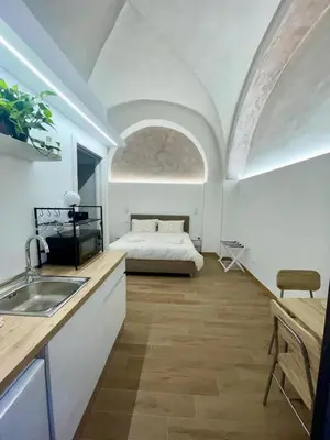 Letto o letti in una camera di 1940 Apartment