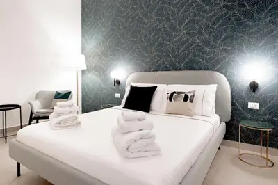 Letto o letti in una camera di Casa Amurusa