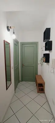 TV o dispositivi per l'intrattenimento presso Casa A Pupidda vicino al mare
