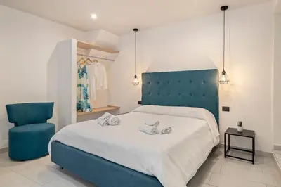 Letto o letti in una camera di B&B Casa Giunchiglia