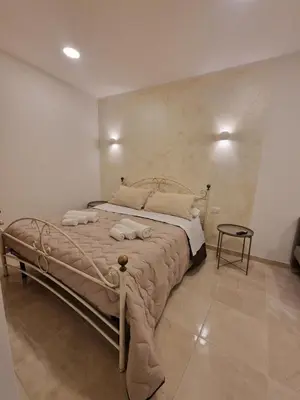 Letto o letti in una camera di House in the castle VIA GRAMIGNANI N 35 CATANIA
