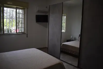 Letto o letti in una camera di Villa Trinacria