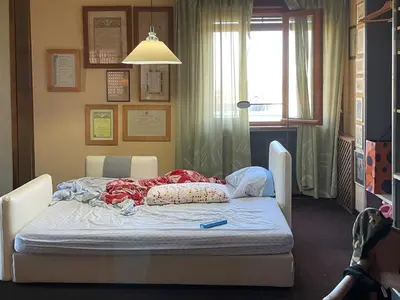 Letto o letti in una camera di LOFT vintage in the archeosites, GARAGE and BIKES