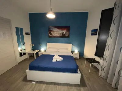 Letto o letti in una camera di Gianluca Home