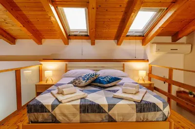 Letto o letti in una camera di la casa di carta al centro storico