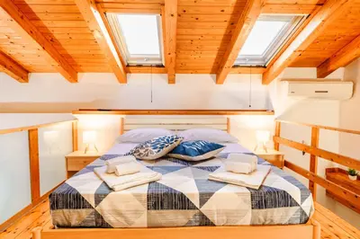 Letto o letti in una camera di la casa di carta al centro storico
