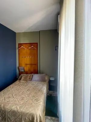 Letto o letti in una camera di FIVE ROOMS in the archeosites, GARAGE and BIKES