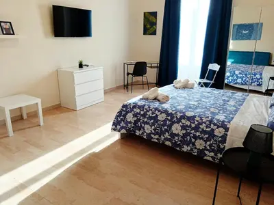 Letto o letti in una camera di Balcone Etnea in Catania centro