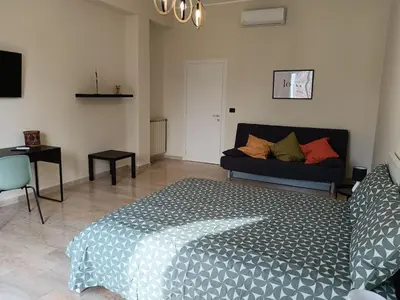 Letto o letti in una camera di Balcone Etnea in Catania centro