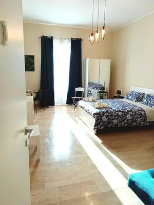 Letto o letti in una camera di Balcone Etnea in Catania centro