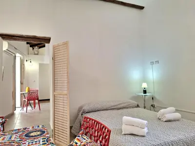 Letto o letti in una camera di Nata Sicula 3