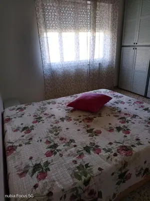 Letto o letti in una camera di I due mariti