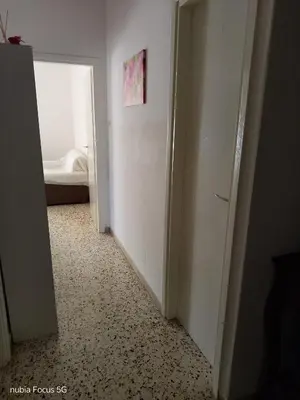 Letto o letti in una camera di I due mariti