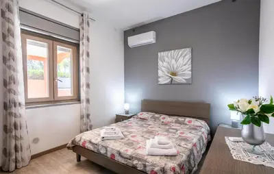 Letto o letti in una camera di Villa Lucy
