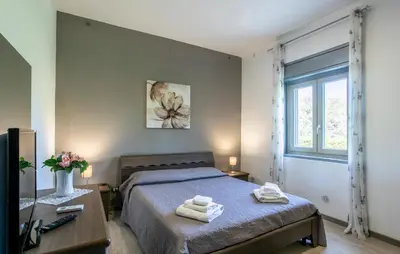 Letto o letti in una camera di Villa Lucy