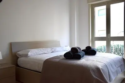 Letto o letti in una camera di Vela Barocca