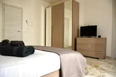Letto o letti in una camera di Vela Barocca