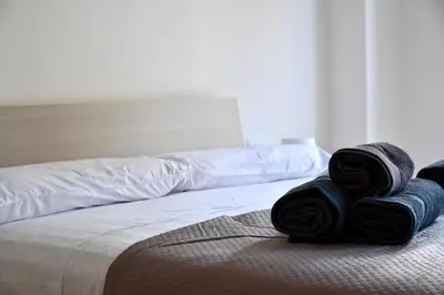 Letto o letti in una camera di Vela Barocca