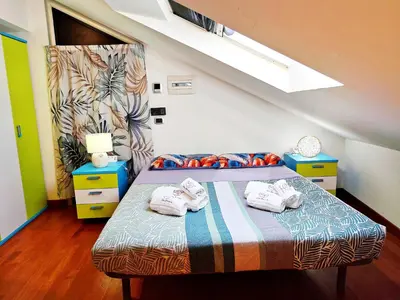Letto o letti in una camera di Suite Harmony