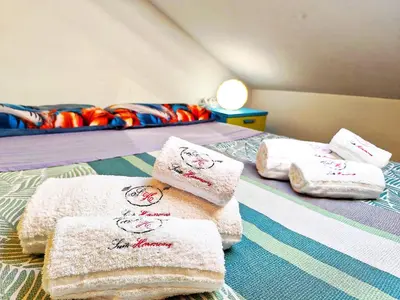 Letto o letti in una camera di Suite Harmony