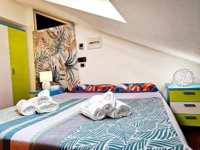 Letto o letti in una camera di Suite Harmony