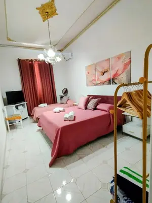 Letto o letti in una camera di Casa Linda Av
