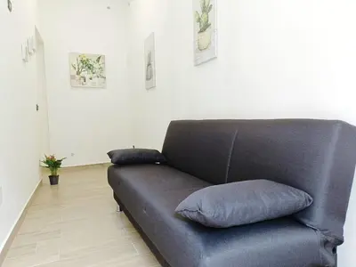 Area soggiorno di Simonetta's APT